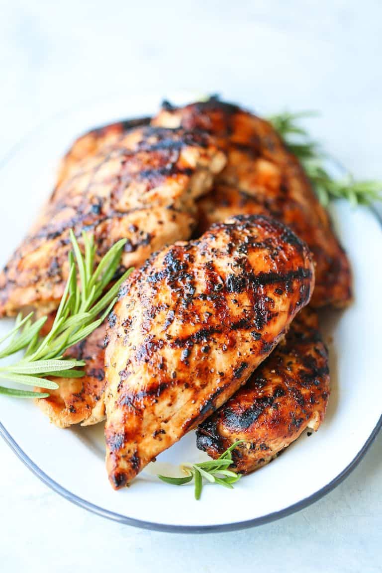 maple rosemary grilled chicken on a white and gray plate
