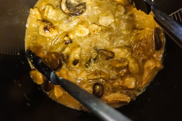 chicken marsala cooking in a slow cooker