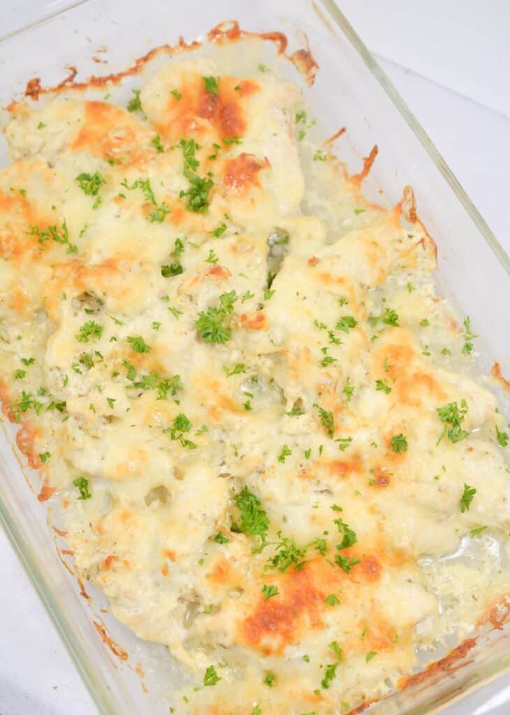 Low Carb Chicken Casserole Recipe in a glass baking dish, garnished with parsley