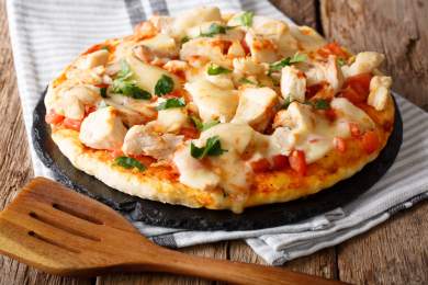 buffalo chicken on top of a pizza crust