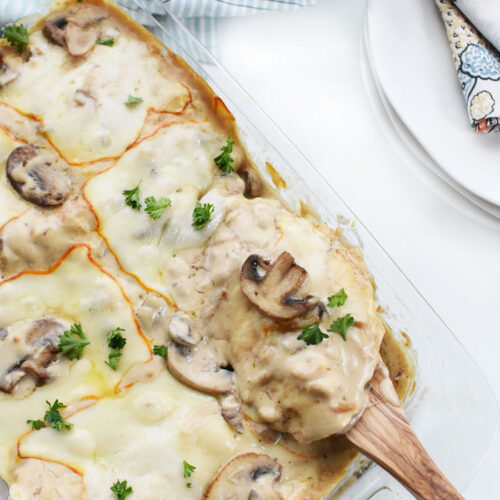 dish of cheesy chicken with mushrooms