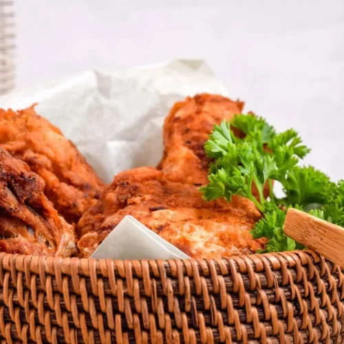 pieces of fried chicken in a basket
