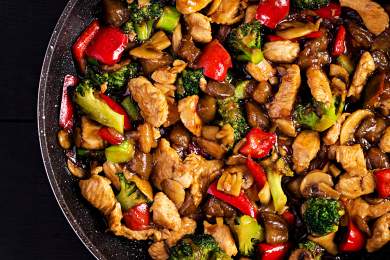 chicken and vegetables in a pan