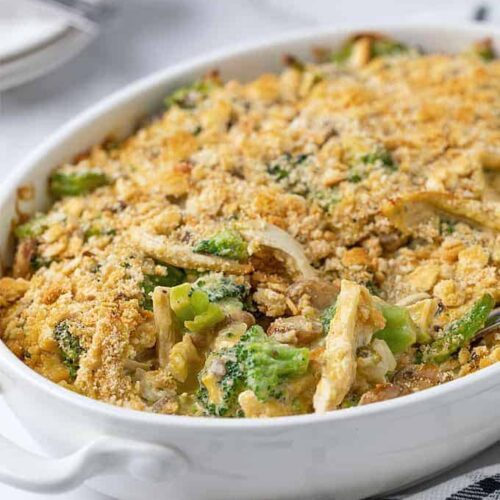 casserole dish containing chicken broccoli and mushrooms