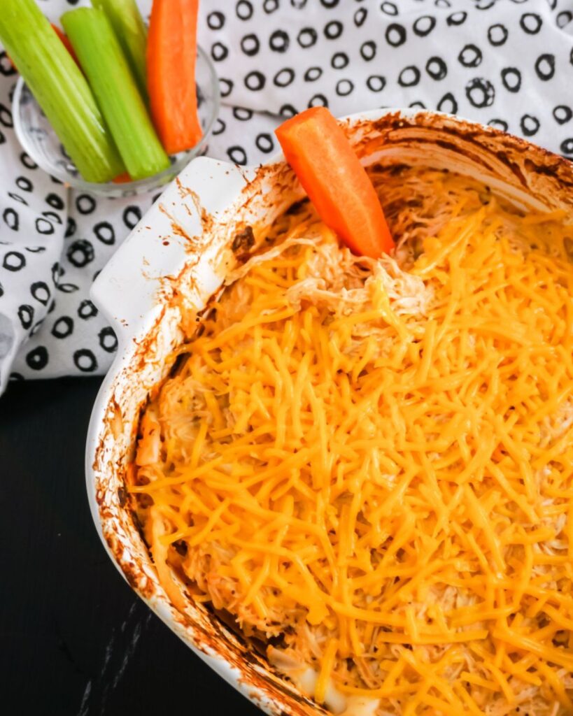 Frank’s Red Hot Buffalo Chicken Dip in a white casserole dish.